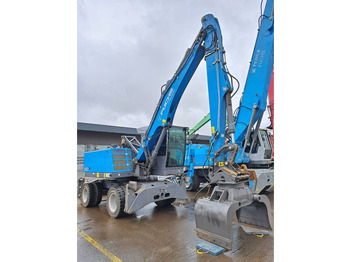 Manipulador de materiales para transporte de basura Fuchs MHL 310: foto 3