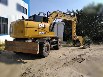 Excavadora de ruedas CATERPILLAR M315