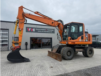 Excavadora de ruedas KOMATSU PW148-8