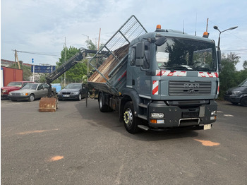 Volquete camión MAN TGA 18.310