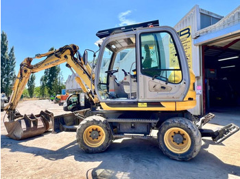 Excavadora de ruedas New Holland MH 2.6 PELLE A PNEUS 10T: foto 2