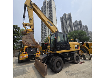 Excavadora de ruedas CATERPILLAR M320