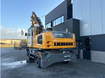 Manipulador de materiales para transporte de basura Liebherr LH 30 M: foto 4