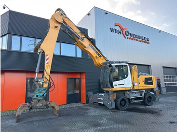 Manipulador de materiales para transporte de basura Liebherr LH 30 M: foto 2