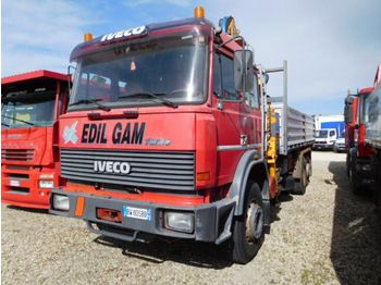 Volquete camión Iveco 240.36: foto 1