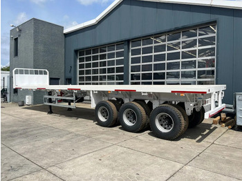 Leasing financiero de CIMC 3-axle Flatbed Semi-Trailer leasing CIMC 3-axle Flatbed Semi-Trailer: foto 4 Leasing financiero de CIMC 3-axle Flatbed Semi-Trailer leasing CIMC 3-axle Flatbed Semi-Trailer: foto 4