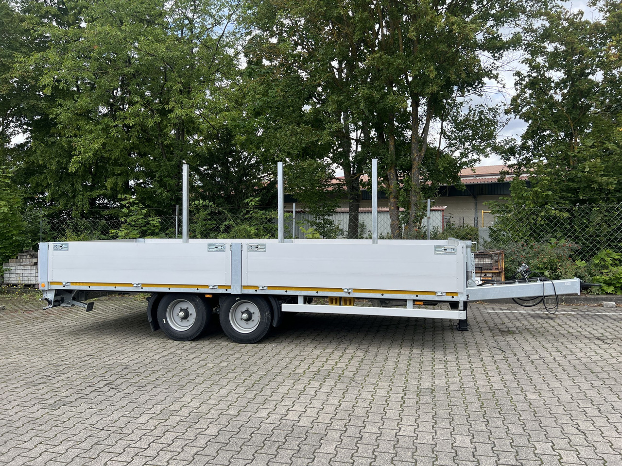 Möslein THT 11- G 6,2 Tandem Pritsche- Tieflader mit Rungentaschen - Remolque plataforma/ Caja abierta: foto 1 Möslein THT 11- G 6,2 Tandem Pritsche- Tieflader mit Rungentaschen - Remolque plataforma/ Caja abierta: foto 1