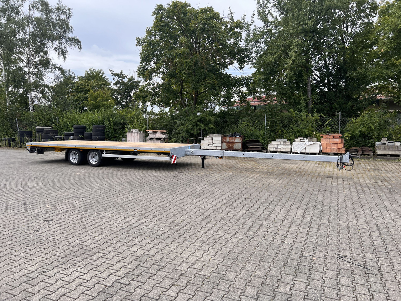 Möslein THT 11 G Ausziehbar 11,9 t Tandemanhänger- Tieflader, ausziehbar - Remolque plataforma/ Caja abierta: foto 1 Möslein THT 11 G Ausziehbar 11,9 t Tandemanhänger- Tieflader, ausziehbar - Remolque plataforma/ Caja abierta: foto 1