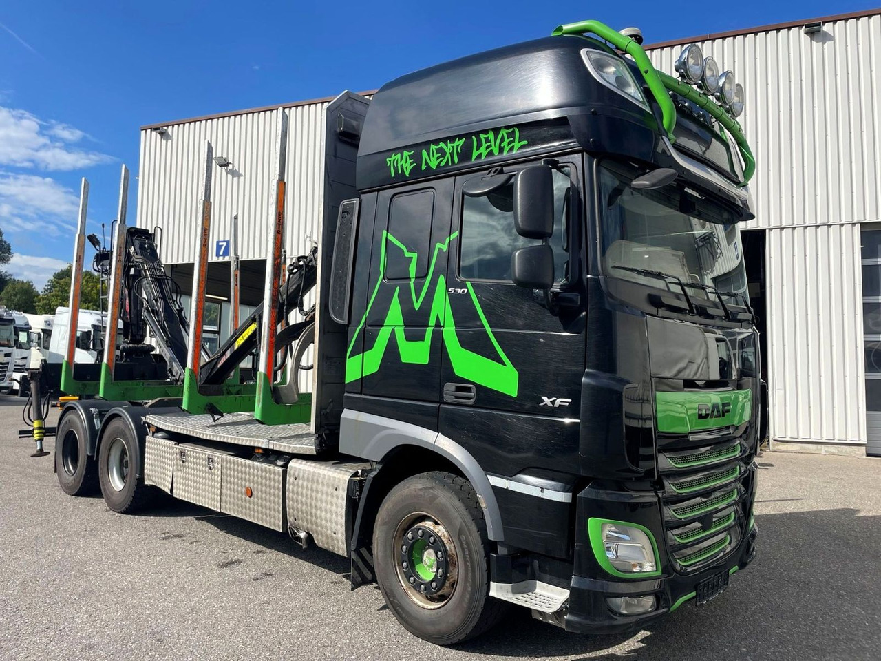 DAF FAT XF 530 SSC, Holztransport, Greifer mit Säge - Camión forestal, Camión grúa: foto 1 DAF FAT XF 530 SSC, Holztransport, Greifer mit Säge - Camión forestal, Camión grúa: foto 1
