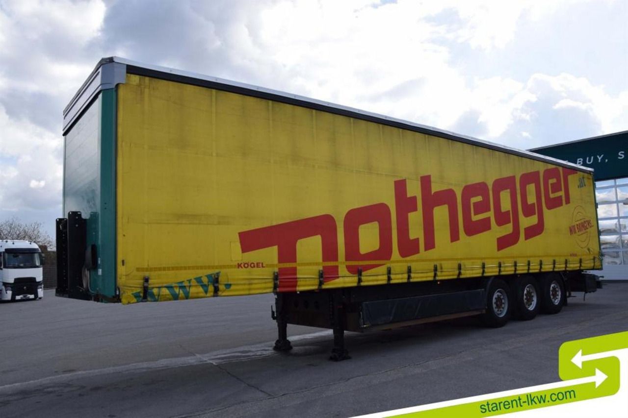 Kögel Tautliner Palettenkasten Lochrahmen SAF - Achsen - Semirremolque lona: foto 1 Kögel Tautliner Palettenkasten Lochrahmen SAF - Achsen - Semirremolque lona: foto 1