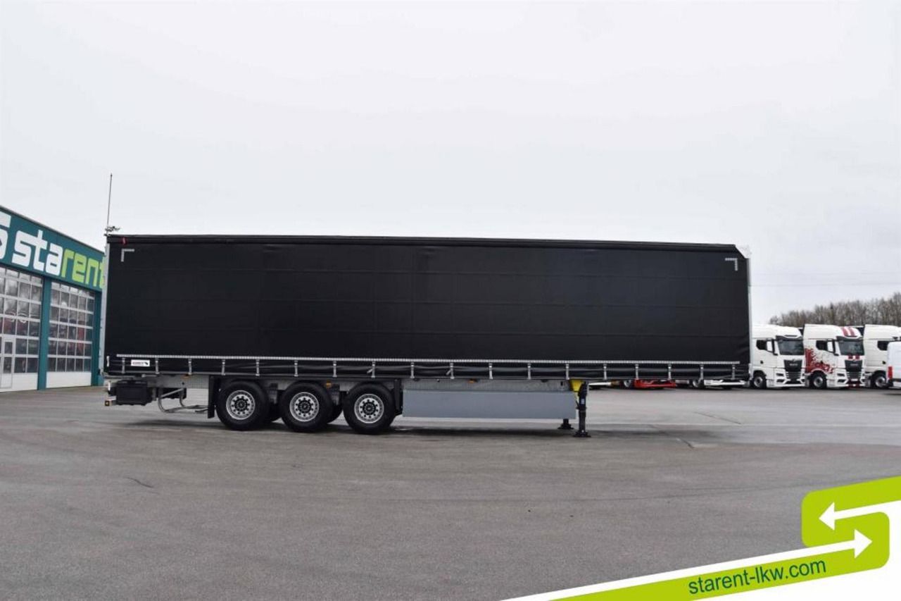 Schmitz Hubdach Liftachse Palettenkasten XL- u. Getränkez. - Semirremolque lona: foto 4 Schmitz Hubdach Liftachse Palettenkasten XL- u. Getränkez. - Semirremolque lona: foto 4