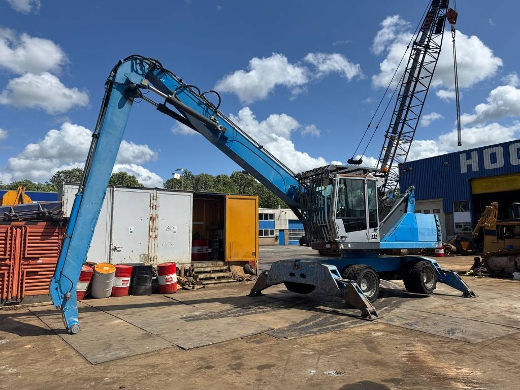 Fuchs MHL 335 - Manipulador de materiales: foto 1 Fuchs MHL 335 - Manipulador de materiales: foto 1