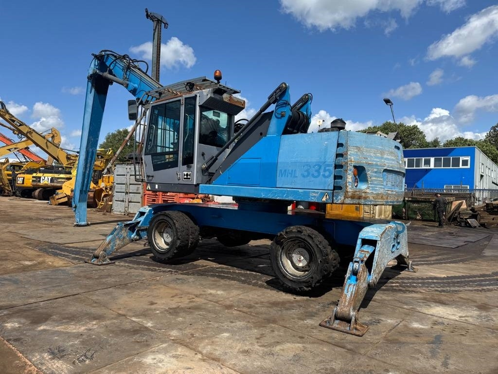 Fuchs MHL 335 - Manipulador de materiales: foto 3 Fuchs MHL 335 - Manipulador de materiales: foto 3