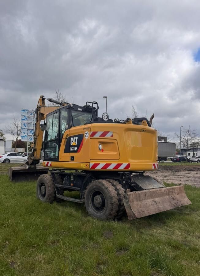 Caterpillar M315F - Excavadora de ruedas: foto 1 Caterpillar M315F - Excavadora de ruedas: foto 1