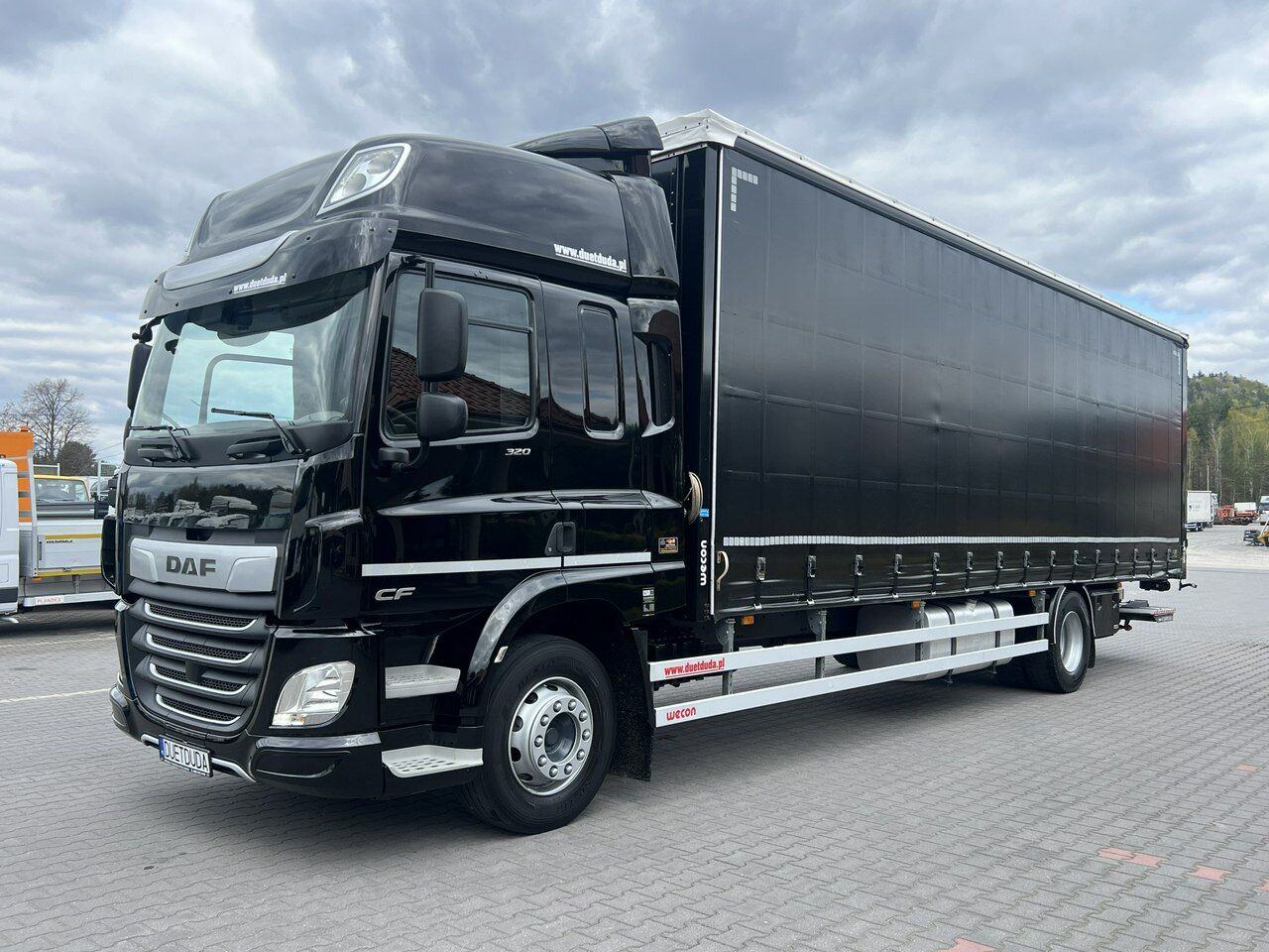 DAF CF 320 E6 Winda Firana Tył Drzwi Dach Zsuwany Długi 9.40m - Camión lona: foto 1 DAF CF 320 E6 Winda Firana Tył Drzwi Dach Zsuwany Długi 9.40m - Camión lona: foto 1