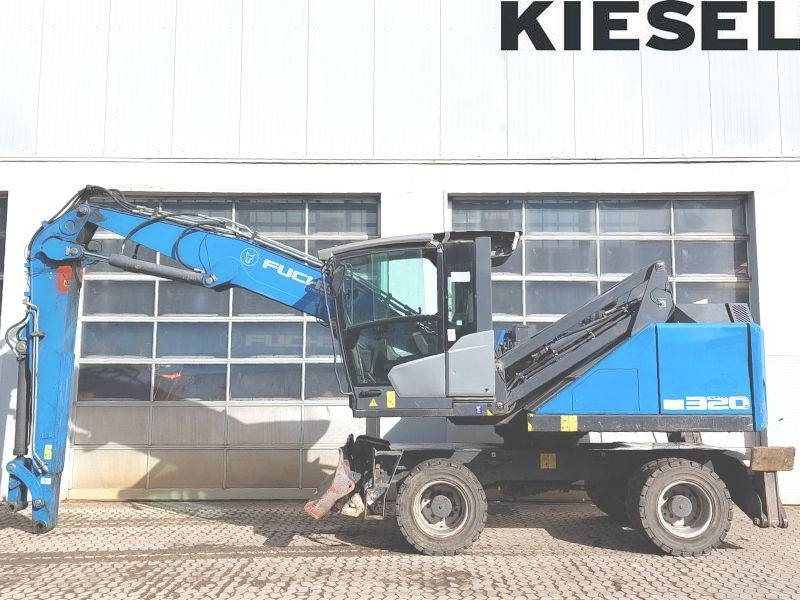 Fuchs MHL 320 F - Manipulador de materiales: foto 1 Fuchs MHL 320 F - Manipulador de materiales: foto 1