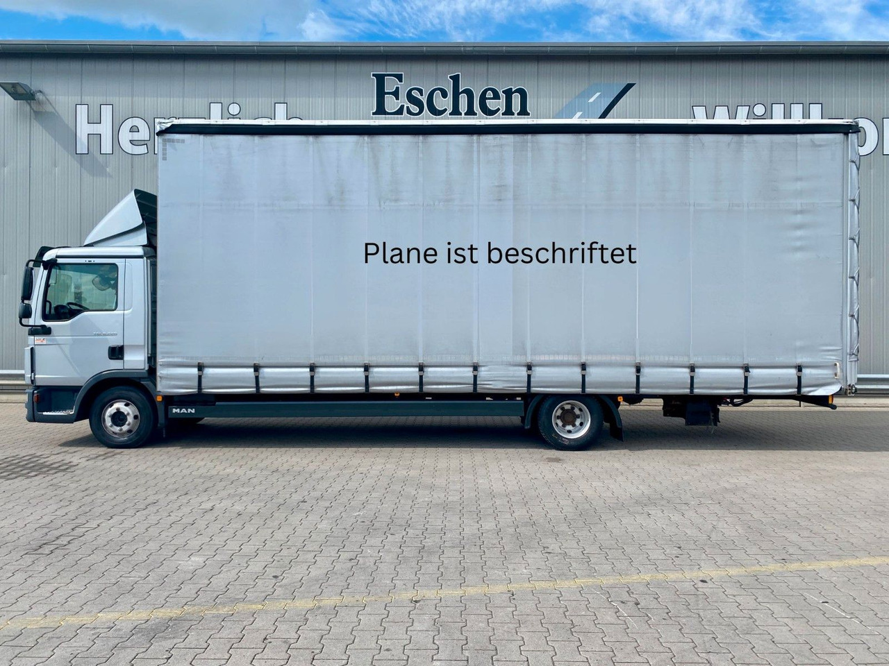MAN TGL 8.220 I Pritsche Plane*Klima*2Tank*Automatik - Camión lona: foto 2 MAN TGL 8.220 I Pritsche Plane*Klima*2Tank*Automatik - Camión lona: foto 2