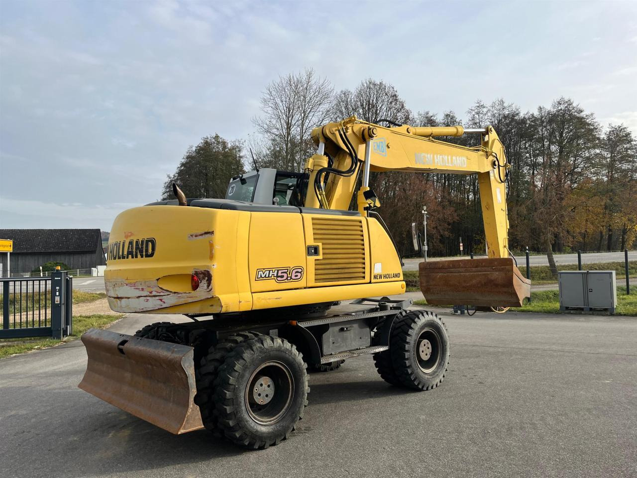 New Holland MH 5.6 inkl. Grabenlöffel, Tieflöffel - Excavadora de ruedas: foto 5 New Holland MH 5.6 inkl. Grabenlöffel, Tieflöffel - Excavadora de ruedas: foto 5