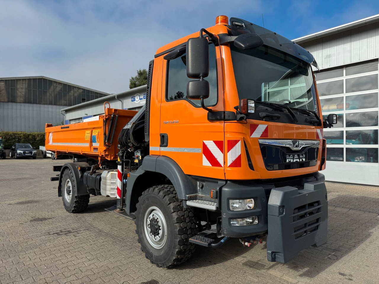 MAN TGM 13.250 4x4 Kipper Kran HIAB Winterd. - Camión grúa: foto 1 MAN TGM 13.250 4x4 Kipper Kran HIAB Winterd. - Camión grúa: foto 1