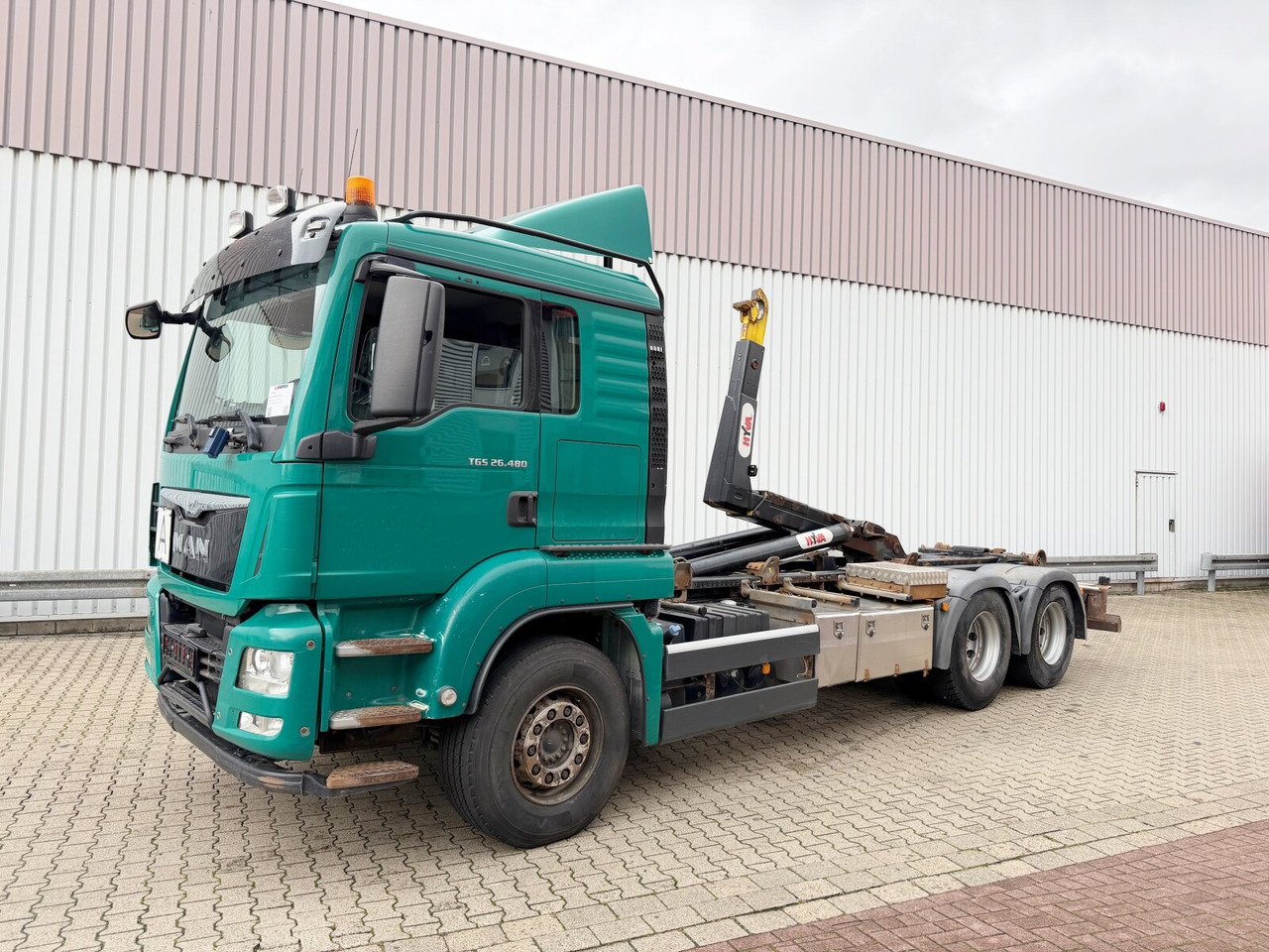 MAN TGS 26.480 6x4 BL TGS 26.480 6x4 BL, Motorabtrieb, Navi, Intarder, Hyva 20.60 S - Multibasculante camión: foto 1 MAN TGS 26.480 6x4 BL TGS 26.480 6x4 BL, Motorabtrieb, Navi, Intarder, Hyva 20.60 S - Multibasculante camión: foto 1