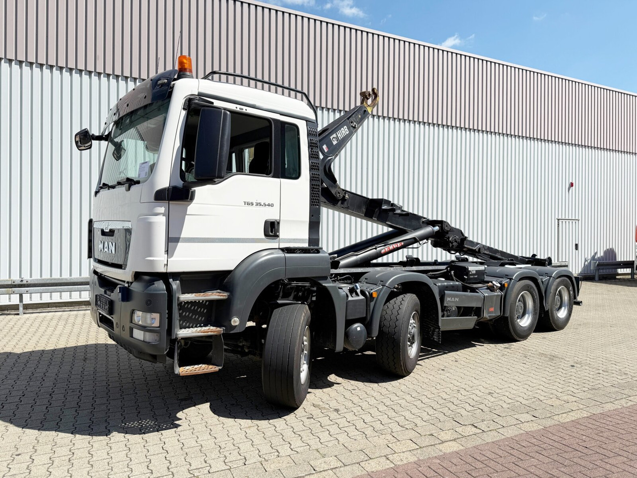 MAN TGS 35.540 8x6H BL TGS 35.540 8x6H BL, HydroDrive, PriTrader, Hiab Abrollkipper bis 7 m - Multibasculante camión: foto 1 MAN TGS 35.540 8x6H BL TGS 35.540 8x6H BL, HydroDrive, PriTrader, Hiab Abrollkipper bis 7 m - Multibasculante camión: foto 1
