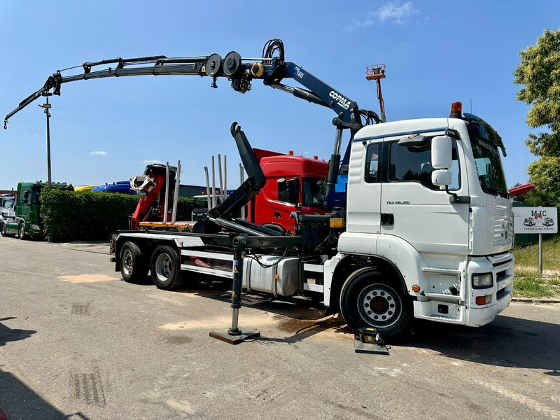 MAN TGA 26.310 6X2 HOOKLIFT + CRANE COPMA 160.4 + JIB J2 + WINCH - RADIO - LIFT + STEERING AXLE - EURO 3 - BE - Camión grúa: foto 1 MAN TGA 26.310 6X2 HOOKLIFT + CRANE COPMA 160.4 + JIB J2 + WINCH - RADIO - LIFT + STEERING AXLE - EURO 3 - BE - Camión grúa: foto 1