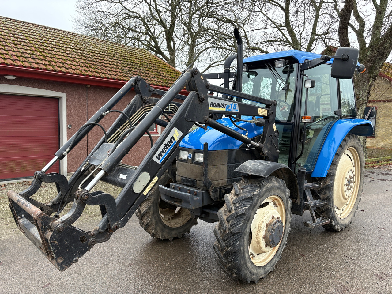 New Holland TS90 - Tractor: foto 1 New Holland TS90 - Tractor: foto 1