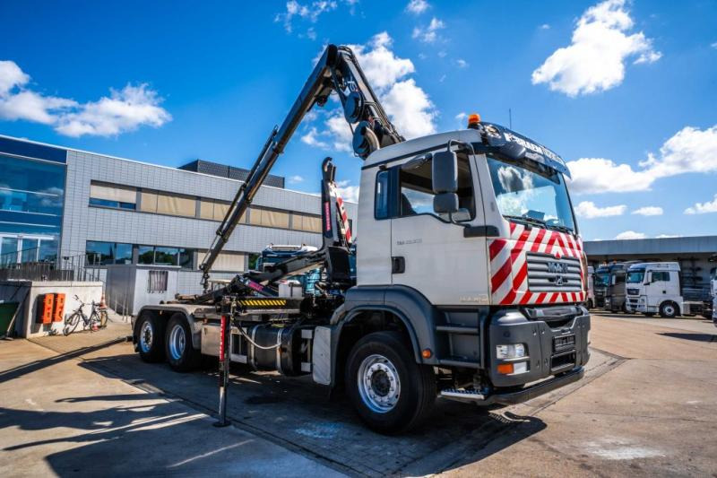 MAN TGA 26.320 BL -6X2-4+HIAB 122 E3 HIDUO - Multibasculante camión, Camión grúa: foto 2 MAN TGA 26.320 BL -6X2-4+HIAB 122 E3 HIDUO - Multibasculante camión, Camión grúa: foto 2