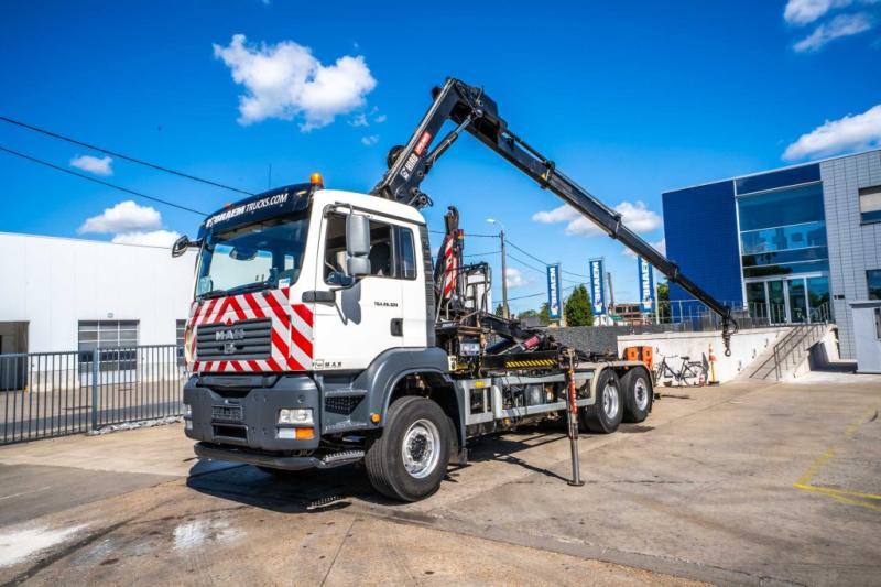 MAN TGA 26.320 BL -6X2-4+HIAB 122 E3 HIDUO - Multibasculante camión, Camión grúa: foto 1 MAN TGA 26.320 BL -6X2-4+HIAB 122 E3 HIDUO - Multibasculante camión, Camión grúa: foto 1