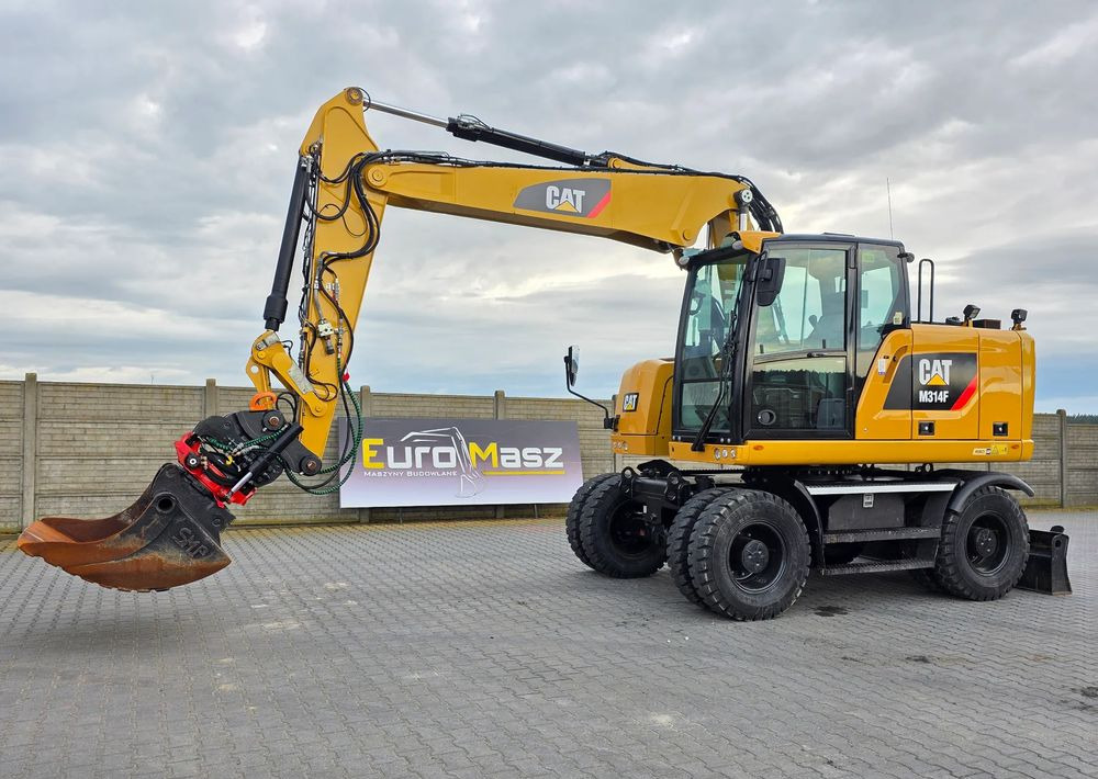 Caterpillar M314F, 2016 ROK, GŁOWICA ROTOTILT, 4400 MTH - Excavadora de ruedas: foto 1 Caterpillar M314F, 2016 ROK, GŁOWICA ROTOTILT, 4400 MTH - Excavadora de ruedas: foto 1