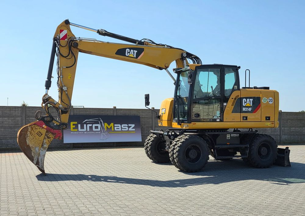 Caterpillar M314F, 2019 ROK, 3300 MTH, OIL QUICK OQ 65 - Excavadora de ruedas: foto 1 Caterpillar M314F, 2019 ROK, 3300 MTH, OIL QUICK OQ 65 - Excavadora de ruedas: foto 1