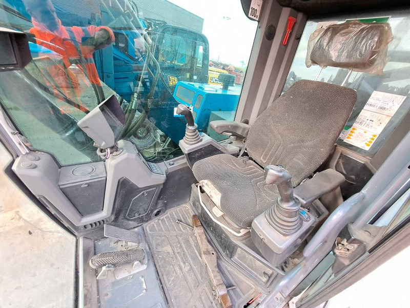 Manipulador de materiales para transporte de basura Fuchs MHL 310: foto 16
