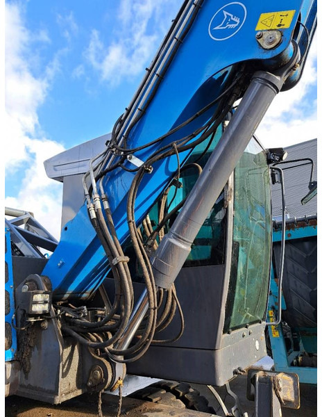 Manipulador de materiales para transporte de basura Fuchs MHL 310: foto 18