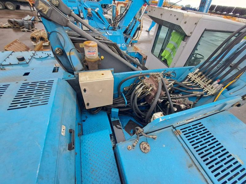 Manipulador de materiales para transporte de basura Fuchs MHL 350 C: foto 8 Manipulador de materiales para transporte de basura Fuchs MHL 350 C: foto 8