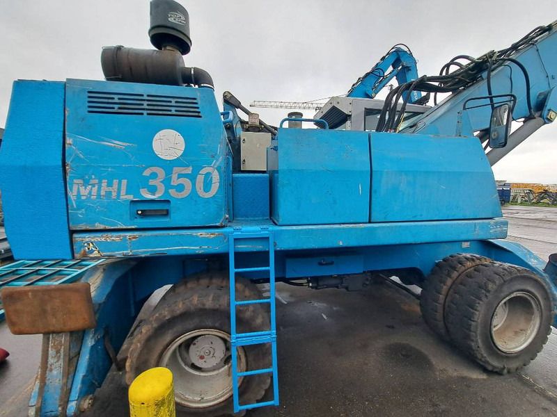 Manipulador de materiales para transporte de basura Fuchs MHL 350 C: foto 7 Manipulador de materiales para transporte de basura Fuchs MHL 350 C: foto 7