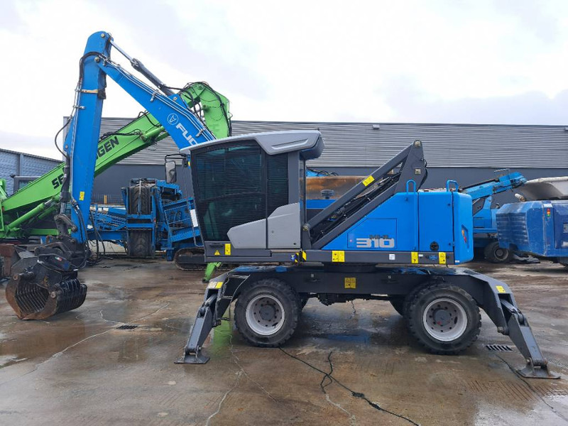 Fuchs MHL310F + Grapple - Manipulador de materiales: foto 4 Fuchs MHL310F + Grapple - Manipulador de materiales: foto 4