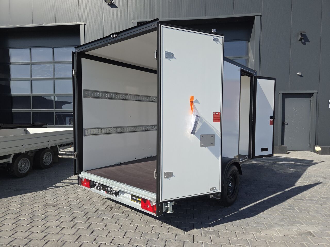 Kargo FS1330/180HLST 305x159x180cm Premium black/white Seitentür GFK Zurrsystem (M) 1300kg 100km/H - Caja cerrada remolque: foto 1 Kargo FS1330/180HLST 305x159x180cm Premium black/white Seitentür GFK Zurrsystem (M) 1300kg 100km/H - Caja cerrada remolque: foto 1