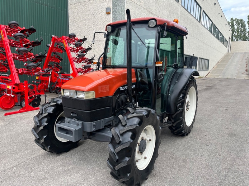 New Holland TN 55 D - Tractor: foto 1 New Holland TN 55 D - Tractor: foto 1