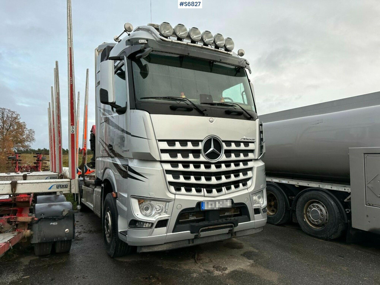 Timber truck Mercedes-Benz Arocs 2863 with crane - Camión forestal: foto 1 Timber truck Mercedes-Benz Arocs 2863 with crane - Camión forestal: foto 1