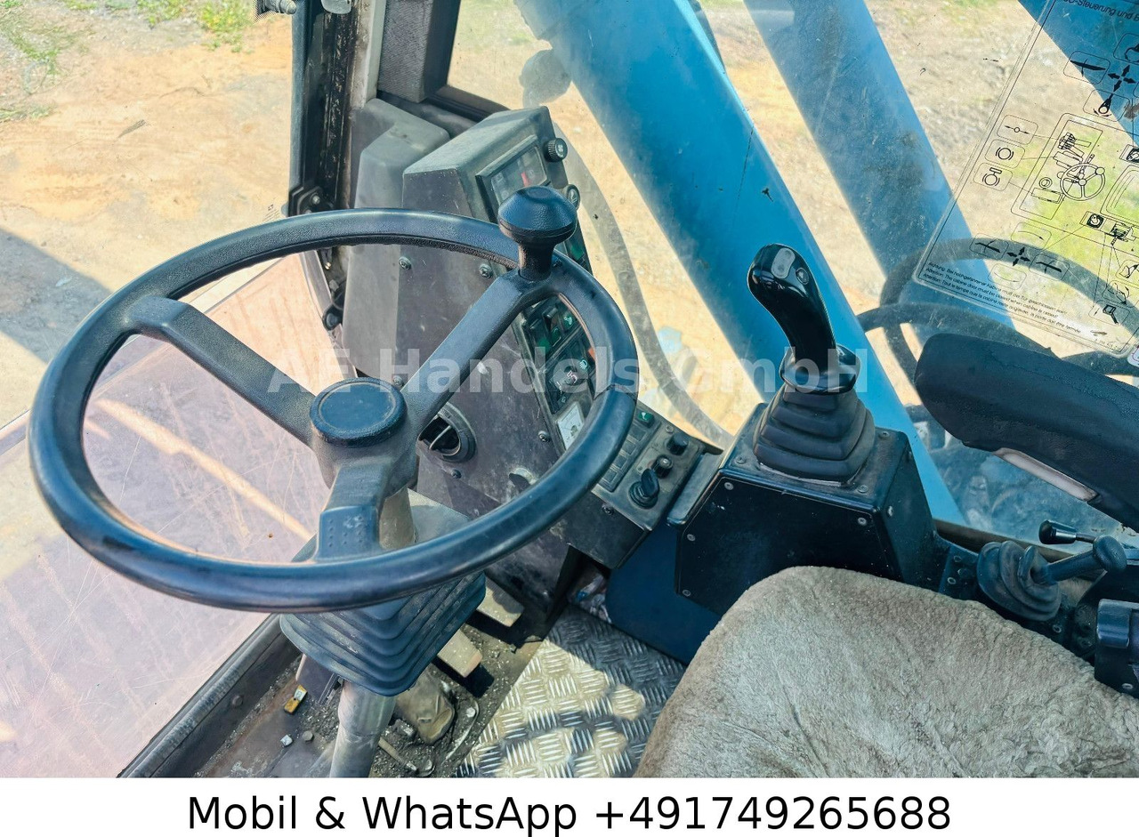 Excavadora de ruedas Terex MHL 331 Umschlagbagger: foto 23 Excavadora de ruedas Terex MHL 331 Umschlagbagger: foto 23