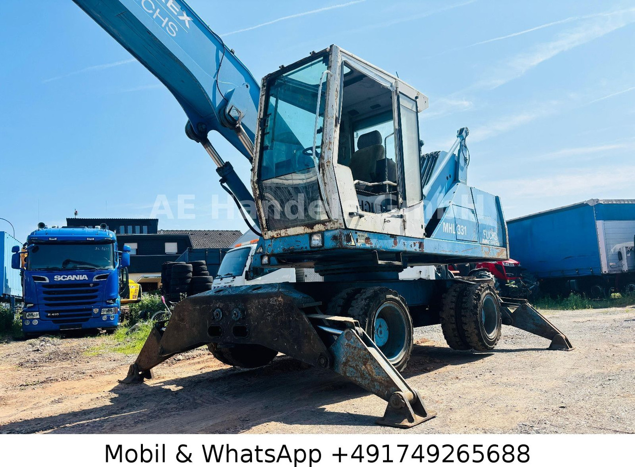 Excavadora de ruedas Terex MHL 331 Umschlagbagger: foto 14 Excavadora de ruedas Terex MHL 331 Umschlagbagger: foto 14