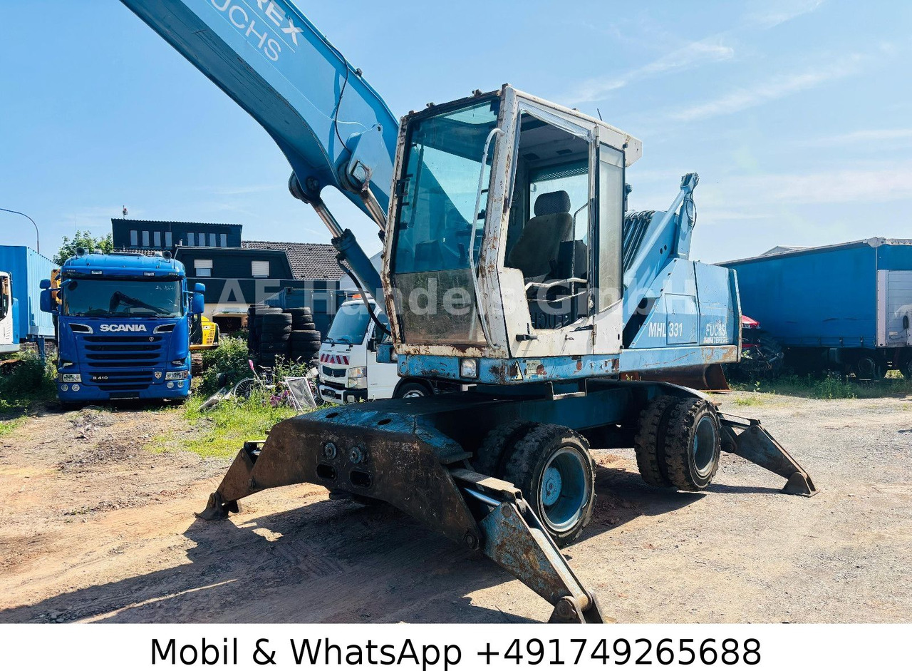 Excavadora de ruedas Terex MHL 331 Umschlagbagger: foto 7 Excavadora de ruedas Terex MHL 331 Umschlagbagger: foto 7