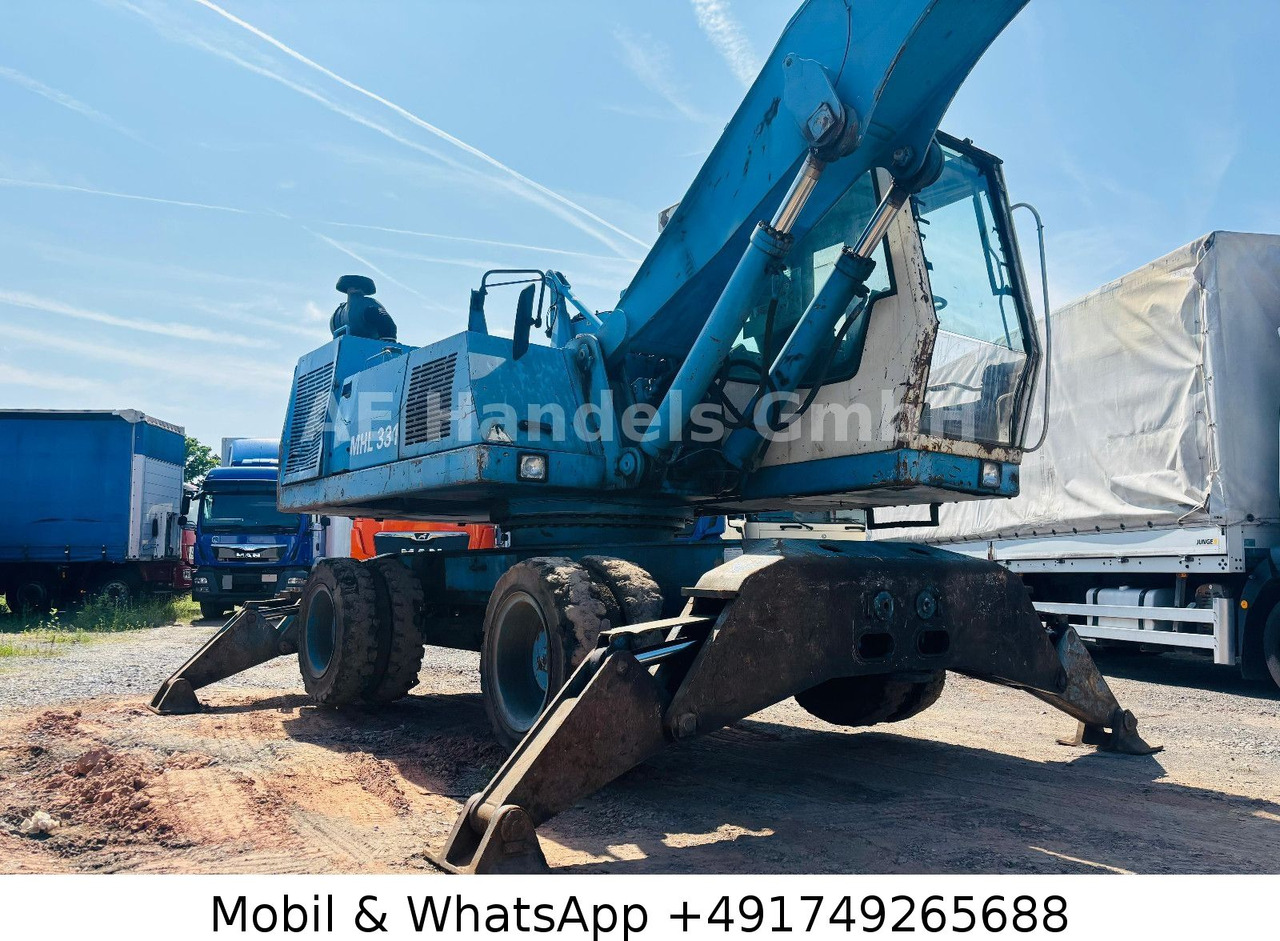 Excavadora de ruedas Terex MHL 331 Umschlagbagger: foto 13 Excavadora de ruedas Terex MHL 331 Umschlagbagger: foto 13
