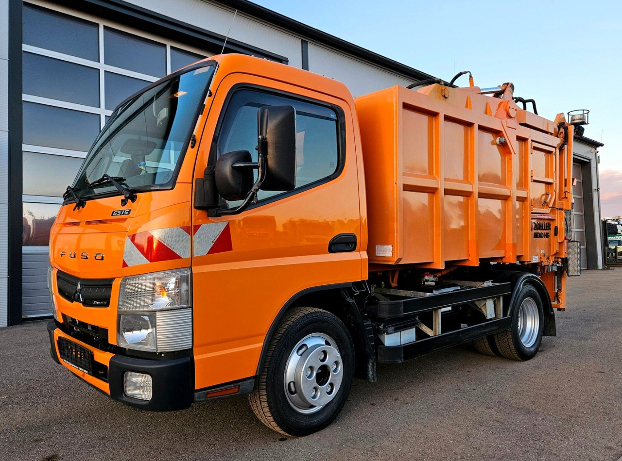 Mitsubishi Fuso Canter 6S15 Zoeller Micro Müllpresse - Camión de basura: foto 1 Mitsubishi Fuso Canter 6S15 Zoeller Micro Müllpresse - Camión de basura: foto 1