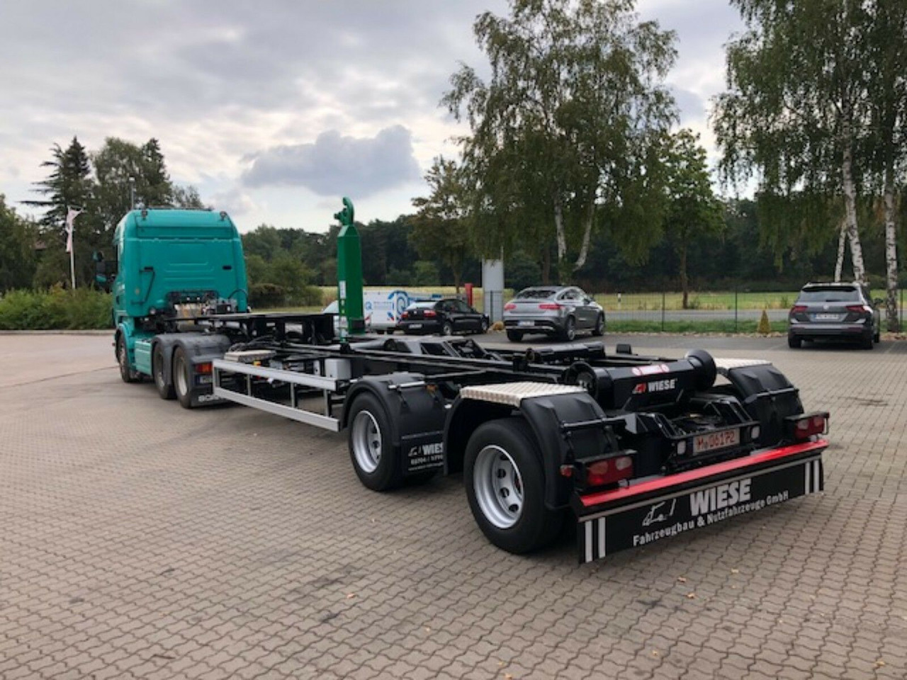 Auflieger Abrollkipper Hakenlift Hooklift - Portacontenedore/ Intercambiable semirremolque: foto 1 Auflieger Abrollkipper Hakenlift Hooklift - Portacontenedore/ Intercambiable semirremolque: foto 1