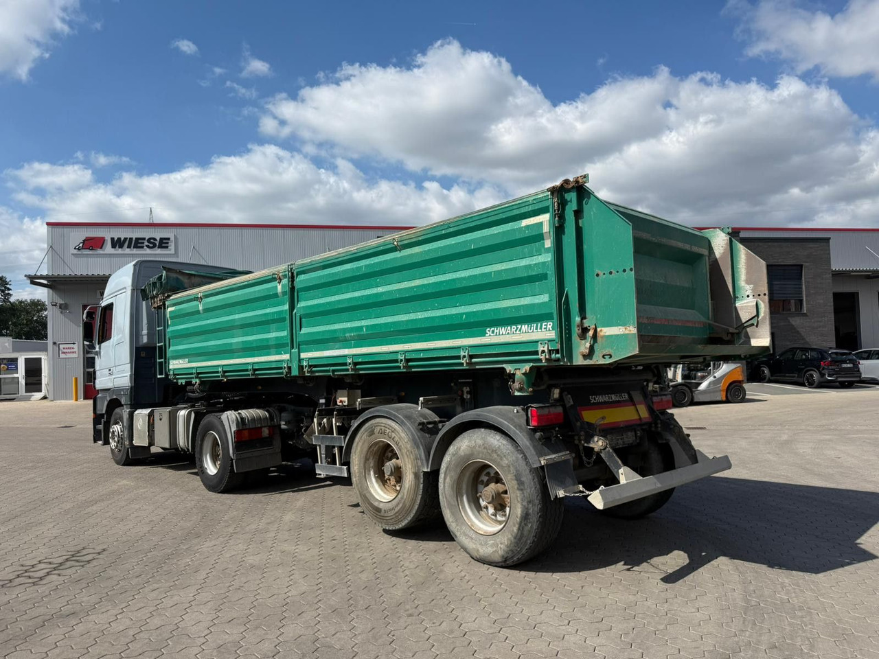 Schwarzmüller 2 Achs Dreiseitenkipper 21m³ mit elektr. Verdeck - Volquete remolque: foto 1 Schwarzmüller 2 Achs Dreiseitenkipper 21m³ mit elektr. Verdeck - Volquete remolque: foto 1