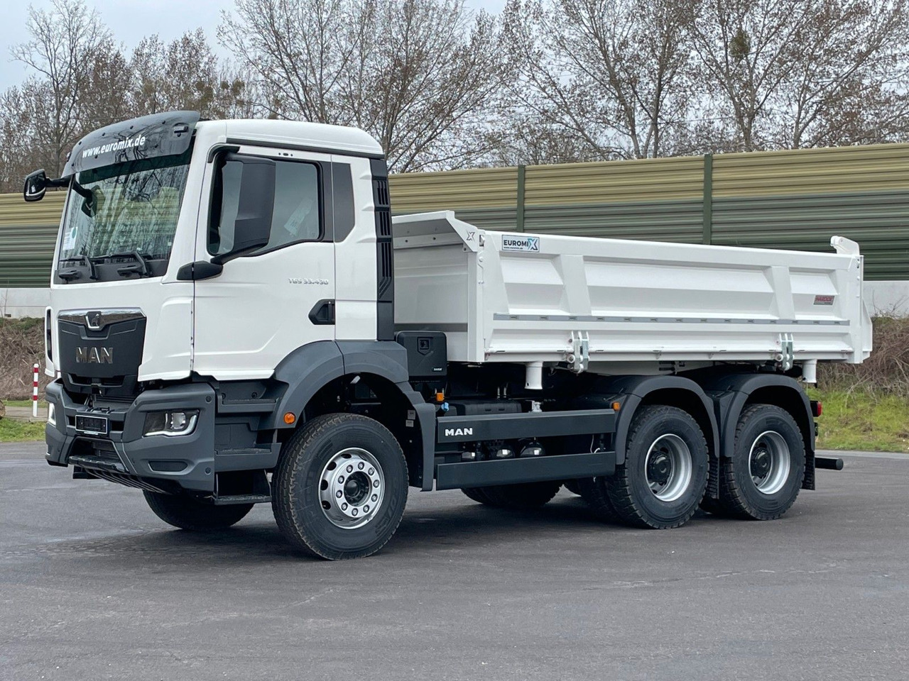MAN TGS 33.440 6x4 /Euro6 3-Seiten-Kipper EuromixMTP - Volquete camión: foto 1 MAN TGS 33.440 6x4 /Euro6 3-Seiten-Kipper EuromixMTP - Volquete camión: foto 1