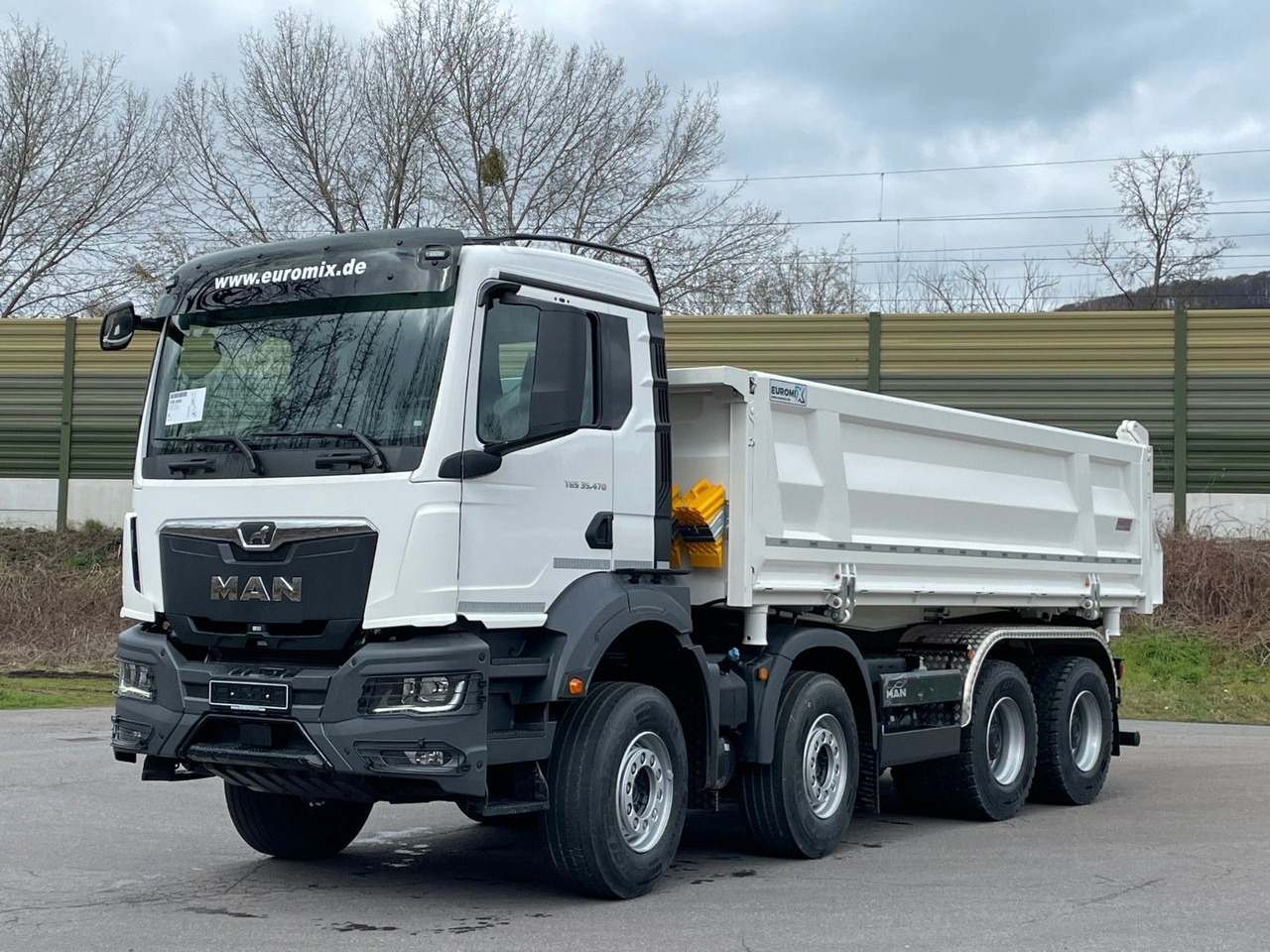MAN TGS 35.520 8x4 EuromixMTP 3-Seiten-Kipper - Volquete camión: foto 1 MAN TGS 35.520 8x4 EuromixMTP 3-Seiten-Kipper - Volquete camión: foto 1