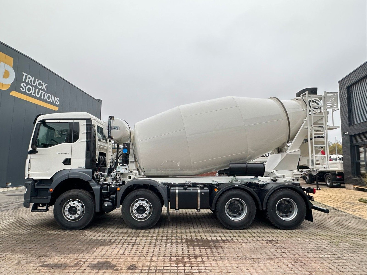 MAN TGS 41.480 8x4 WECHSELSYSTEM KIPPER+MISCHER - Volquete camión: foto 2 MAN TGS 41.480 8x4 WECHSELSYSTEM KIPPER+MISCHER - Volquete camión: foto 2