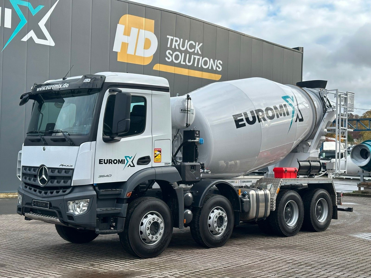Mercedes-Benz Arocs 5 3540 8x4 EURO 6e EuromixMTP EM 9 L Mercedes-Benz Arocs 5 3540 8x4 EURO 6e EuromixMTP EM 9 L - Camión hormigonera: foto 1 Mercedes-Benz Arocs 5 3540 8x4 EURO 6e EuromixMTP EM 9 L Mercedes-Benz Arocs 5 3540 8x4 EURO 6e EuromixMTP EM 9 L - Camión hormigonera: foto 1